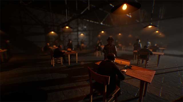 Đối mặt với một chiếc máy đánh chữ trên bàn và nòng súng lục giơ lên ​​trước mặt